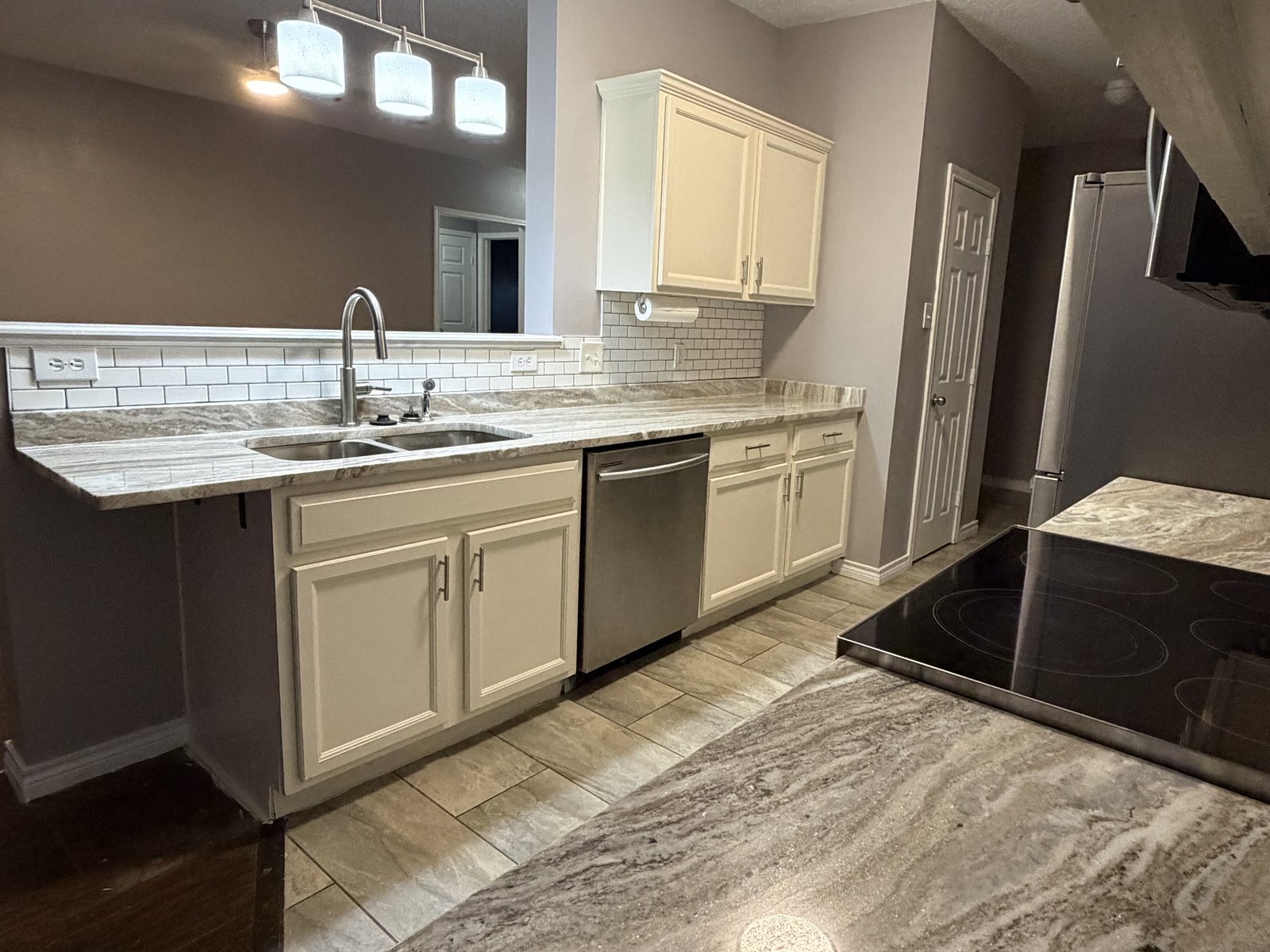 Kitchen — sink & breakfast bar — after